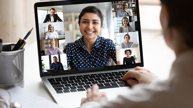 Person attending online education on laptop