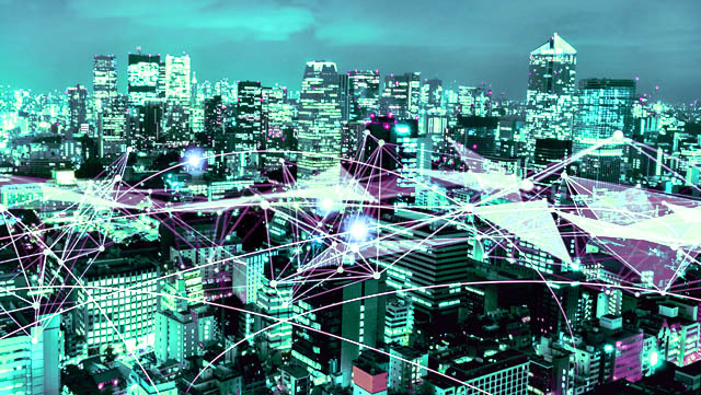 Digital patterns across city building skyline